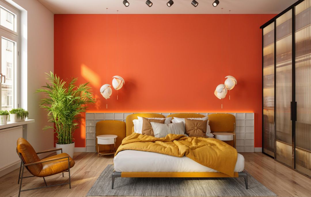 Tendencias de interiorismo en 2026: ¿qué se llevará? tendencias interiorismo 2026 plasmadas en un dormitorio con tonos cálidos