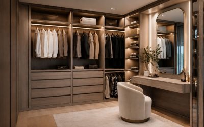 Larmario: 25 años siendo fabricante e instaladores de armarios, vestidores, puertas, suelos y muebles auxiliares Vestidor con tocador moderno a medida con iluminación integrada y acabados en madera