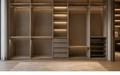 Larmario: 25 años siendo fabricante e instaladores de armarios, vestidores, puertas, suelos y muebles auxiliares Interior de armario a medida con barras, baldas y cajones de Larmario